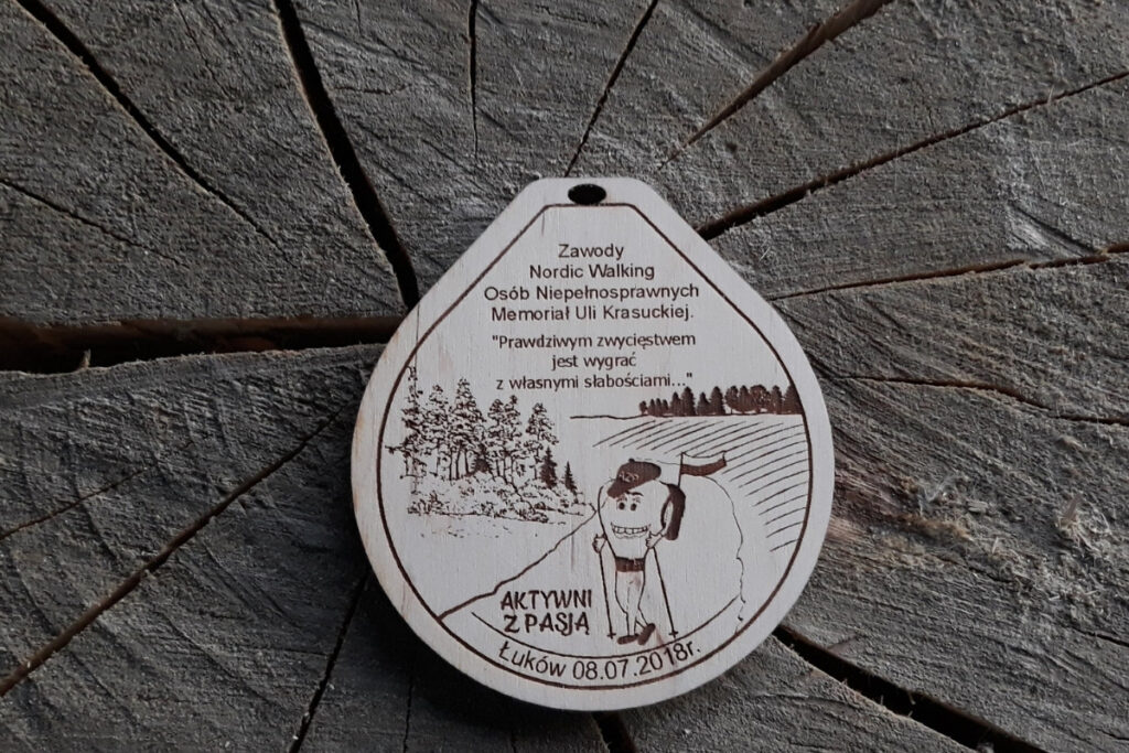 Zawody Nordic Walking Osób Niepełnosprawnych – drewniany pamiątkowy medal Zawody Nordic Walking Osób Niepełnosprawnych – drewniany pamiątkowy medal