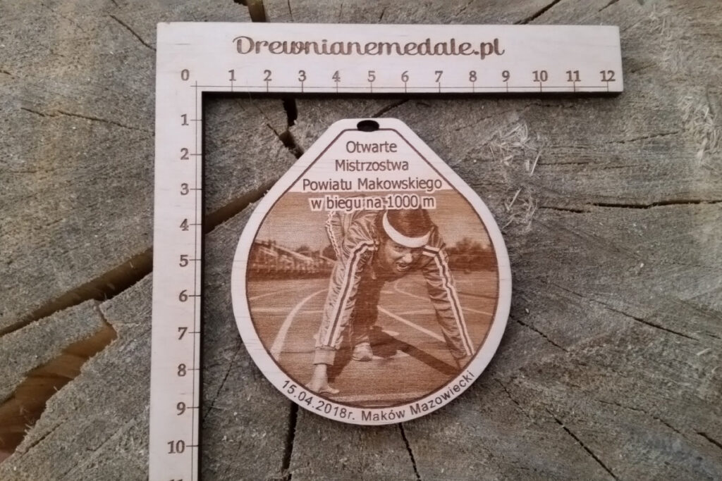 Medal z wizerunkiem biegacza na bieżni lekkoatletycznej Medal z wizerunkiem biegacza na bieżni lekkoatletycznej