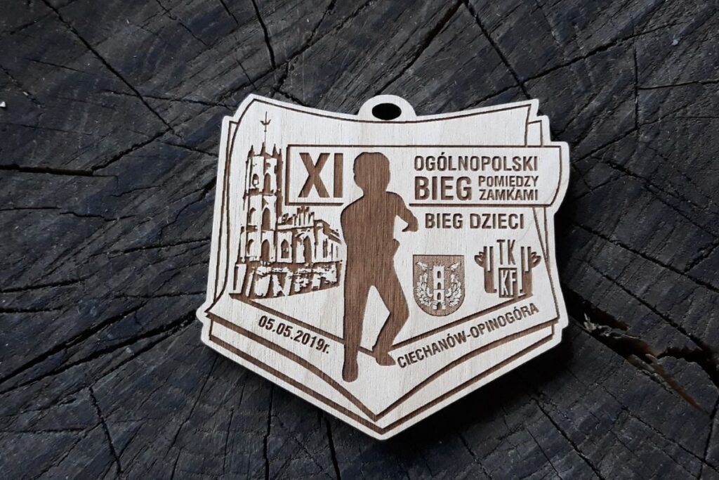 XI ogólnopolski Bieg dla Dzieci Pomiędzy Zamkami – drewniany medal XI ogólnopolski Bieg dla Dzieci Pomiędzy Zamkami – drewniany medal