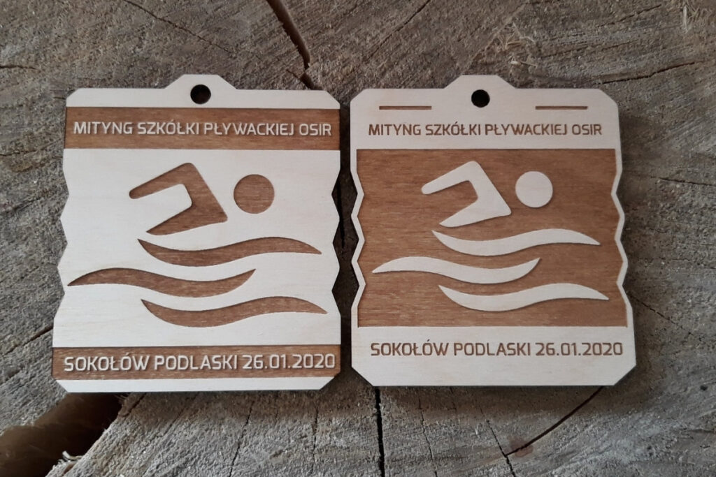Drewniane medale na Mityng Szkółki Pływackiej