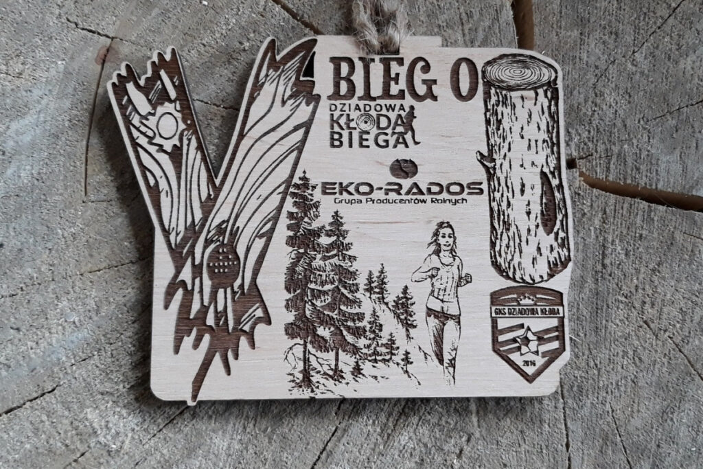 V Bieg o Kłodę – drewniany medal z dużą V